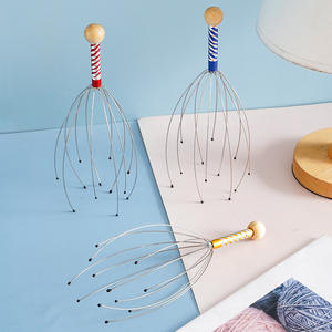 Extractor de ALMA de pulpo de mano, dispositivo de alivio de meridianos de cinco garras, rascador de cuero cabelludo, rodillo de relajación, masajeador de cabeza de bola para el cuerpo - Product Image 1