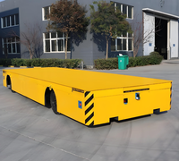 Chariot de transport robuste conçu pour le déplacement sûr et efficace des matériaux sur les sols des ateliers et dans les entrepôts