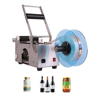 Máquina etiquetadora de botellas de agua semiautomática para aceite, jugo, bebidas, cosméticos, botellas redondas, champú, loción y frascos. - Product Image 1