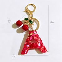 Porte-clés en résine plastique avec lettre dorée, breloque cerise mignonne, pendentif de sac, accessoire pour clés de voiture, cadeau style européen-américain