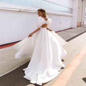 2025 robes <span class=keywords><strong>de</strong></span> mariée élégantes ligne <span class=keywords><strong>de</strong></span> Satin col rond appliqué dentelle Simple longues robes <span class=keywords><strong>de</strong></span> mariée dos nu Illusion <span class=keywords><strong>demi</strong></span> bouffée grande taille - Product Image 1