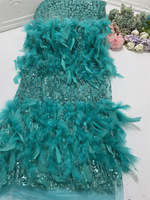 Vente en gros de robe de soirée en plumes faite à la main saupoudrée de tissu pour robe de mariée en maille dorée