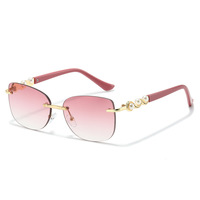 Lunettes de soleil sans monture à perles tendance pour femmes