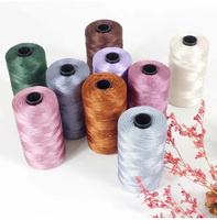 Vente en gros de fils de soie glacée 1.5mm 2mm 3mm 100g/boule de fil de soie d'été brillant pour le tricot à la main au Crochet