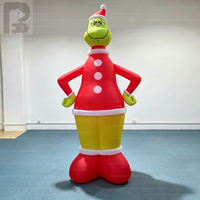 Mascotte gonflable personnalisée du Grinch avec chapeau de Père Noël pour la décoration de l'ambiance de fête de Noël communautaire