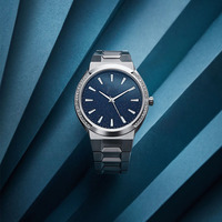 Montre à quartz pour femmes en acier inoxydable avec étoile et diamants écrasés luxe lumineux mode senior