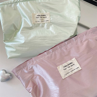 Sac de rangement élégant pour maquillage à paillettes argentées Organisateur de maquillage Organisateur portable pour trousse de toilette avec doublure intérieure