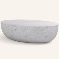 Table basse ovale en marbre travertin naturel de luxe Kumusi, motif éclaboussures d'encre beige, pour salon moderne