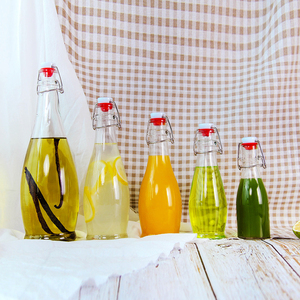 Botella de cerveza de 32 onzas con tapa Flip para Kombucha kéfir de extracto de vainilla <span class=keywords><strong>coquito</strong></span> de jugo de té botellas de cristal - Product Image 6