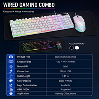 Clavier, souris et tapis de souris filaires 3 en 1 avec rétroéclairage arc-en-ciel pour accessoires informatiques en gros