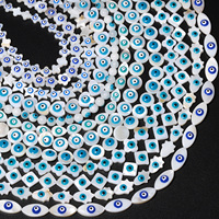 Vente en gros de perles intercalaires en vrac pour la fabrication de bijoux DIY, formes multiples, fond blanc, yeux bleus, perles de corail en os pour collier