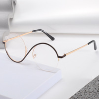Nouvelles Lunettes Rétro Rondes Asymétriques Tendance 2025 Style Ins Personnalisées en Métal pour Femmes Anti-Lumière Bleue Demi-Monture