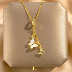 Vintage paslanmaz çelik altın kaplama yonca uzun püskül yay kolye kolye kadınlar için parlak kalp beyaz kabuk kelebek kolye - Product Image 3