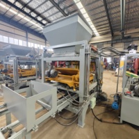 Machine à fabriquer des blocs de ciment hydrauliques QT4-15 pour la construction