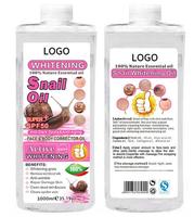 OEM prix usine 1000ml huile d'escargot huile essentielle pour le corps blanchiment de la peau éclaircissant Anti-rides éclaircissant bouteille d'huile corporelle