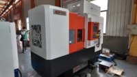 Machine de rectification verticale à table rotative à rigidité élevée série MGS pour le traitement efficace des grandes faces d'emboutissage