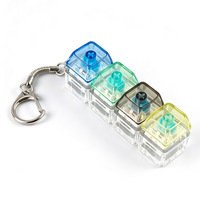 Porte-clés Fidget Transparent 4 Boutons Couleurs Assorties, Pendentif Bouton Clair, Jouet Anti-Stress pour Doigts, Vente en Gros Personnalisée