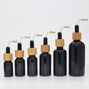 <span class=keywords><strong>Bambou</strong></span> <span class=keywords><strong>noir</strong></span> rond 5ml 10ml 15ml 20ml 30ml 50ml 100ml d'huile de massage étanche compte-gouttes en verre bouteille d'huile à barbe/bouteille en verre - Product Image 3