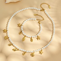 Ensemble de bijoux unisexe Mili Fashion, élégant, série Océan, collier et bracelet en acier inoxydable avec pendentif étoile de mer incrusté de zircon