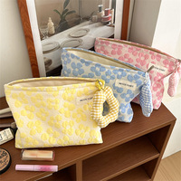Sac de maquillage personnalisé, très attrayant, à la mode, petit, à fleurs, avec fermeture éclair, en polyester, pliable, portable, grande capacité, pour les voyages et le quotidien