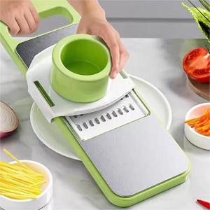 Trancheuse et râpe de cuisine industrielle Outils manuels en acier inoxydable pour fruits et légumes avec coupe-légumes vert en plastique - Product Image 1