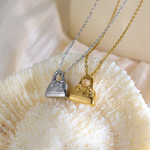 Olivia dernier pendentif minimaliste en acier inoxydable bricolage en gros <span class=keywords><strong>North</strong></span> Star Rose <span class=keywords><strong>sac</strong></span> visage en forme de coeur pour les femmes pour les femmes - Product Image 1