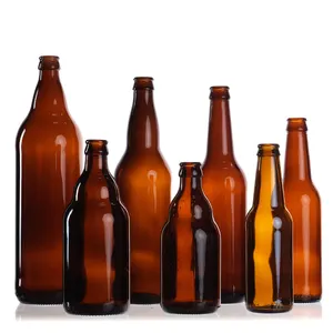 Botol kosong bir botol minum jus 1000ml 500ml 330ml 12oz kaca bentuk bulat botol kaca bir dengan tutup mahkota