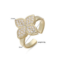 Bague de fiançailles exquise et luxueuse en cuivre incrusté de zircon, motif trèfle à quatre feuilles ajouré pour femme - Cadeau haut de gamme à l'effigie d'un pétale de fleur