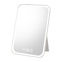Miroir de maquillage LED pliable de table, carré, en verre, rechargeable par USB, finition argentée, écran tactile portable, marque personnalisée, vente en gros