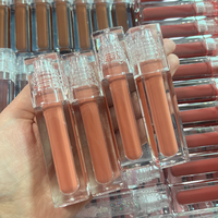 Gloss à lèvres crémeux couleur nude tendance avec emballage de haute qualité noir rose blanc