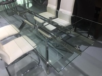 Table à manger en acier inoxydable pivotante étendue en verre peint super blanc avec verre