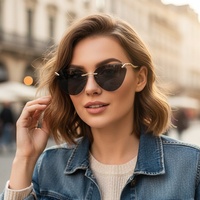 Lunettes de soleil élégantes pour femmes, style œil de chat, sans monture, UV400, avec branches en métal, tendance