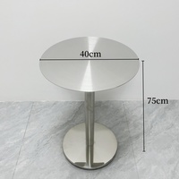 Table de salle à manger extérieure ronde compacte en acier inoxydable, style industriel moderne et épuré, 4 places, pour café et mobilier de salle à manger