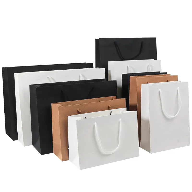 Prezzo basso Stock riutilizzabile Logo stampato Kraft bianco grazie Shopping sacchetto di carta con manico a nastro