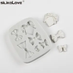 Fashionable diy baking chocolate mould bow heart shaped silicone cake mould bow fondant silicone cake mold for decorating