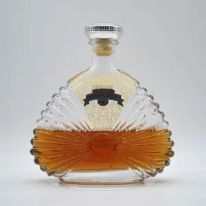 China gran buen precio de fábrica botellas de vidrio para whisky, ron, ginebra con de alivio de diseño de tapón