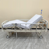 Lit médical électrique 2 fonctions en gros avec télécommande anglaise, matelas étanche et roulettes silencieuses avec frein pour usage clinique