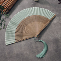 Nouvel éventail pliant de style chinois, couleur unie, portable, en soie ajourée et bambou, polyvalent, pour Cheongsam, Hanfu, décoration intérieure, motif floral
