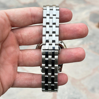 Montre automatique mécanique pour homme en acier inoxydable avec verre saphir, cadran bleu glacé texturé, fenêtre squelette partielle, style affaires