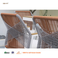 Ensemble de table et chaises de jardin en aluminium blanc moderne BHR, 6 places, avec fauteuils en corde, pour cour et villa.