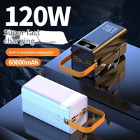 Meilleure vente : Batterie externe 120W grande capacité 60000mAh à charge rapide avec poignée, logo personnalisé pour le camping et le streaming en direct