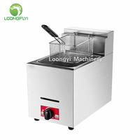 Machine à frire les aliments : chips de pommes de terre, tranches de banane, ailes de poulet, frites, anneaux d'oignon