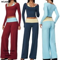 Ensemble de yoga pour femme en tissu brossé color-block, avec t-shirt rembourré à manches longues et pantalon large à taille repliable et effet push-up, tenue de fitness