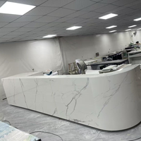 Comptoir de réception moderne en granit blanc poli, surface solide, garantie 10 ans, pour hôtel et service d'accueil