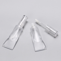 OMI Nouveau Style Plumper 6ml Tubes de brillant à lèvres en plastique transparent Twist up Forme de compression spéciale Conteneur de brillant à lèvres personnalisé