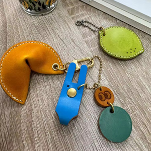 In stock: Crescent moon dumpling <b>leather</b> <b>keychain</b> pendant, lucky charm, peace amulet key accessory. - Product Image 2