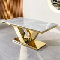Table de salle à manger carrée moderne de luxe en gros, plateau en marbre personnalisable, base en X dorée, gris