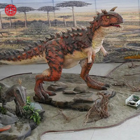 Manèges de parc d'attractions bon marché, costumes de dinosaures animatroniques