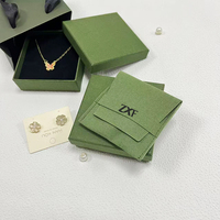 Boîte de rangement pliable en carton vert personnalisée ZXF pour boucles d'oreilles avec pochette pour colliers