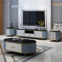 Table basse ronde de luxe exquise en acier inoxydable et base en bois massif pour salon et salle à manger à Foshan